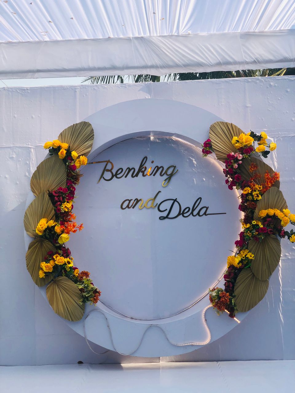 Elegant wedding backdrop decoration by ChrisVille with lush floral arrangements