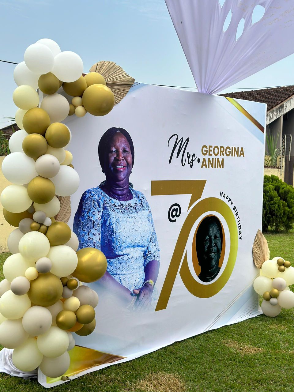 Beautifully decorated 70th birthday celebration with custom banner